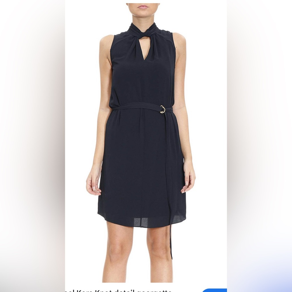 Michael Kors Navy Sleeveless Midi Dress 21” ptp. The length is 38 inches.